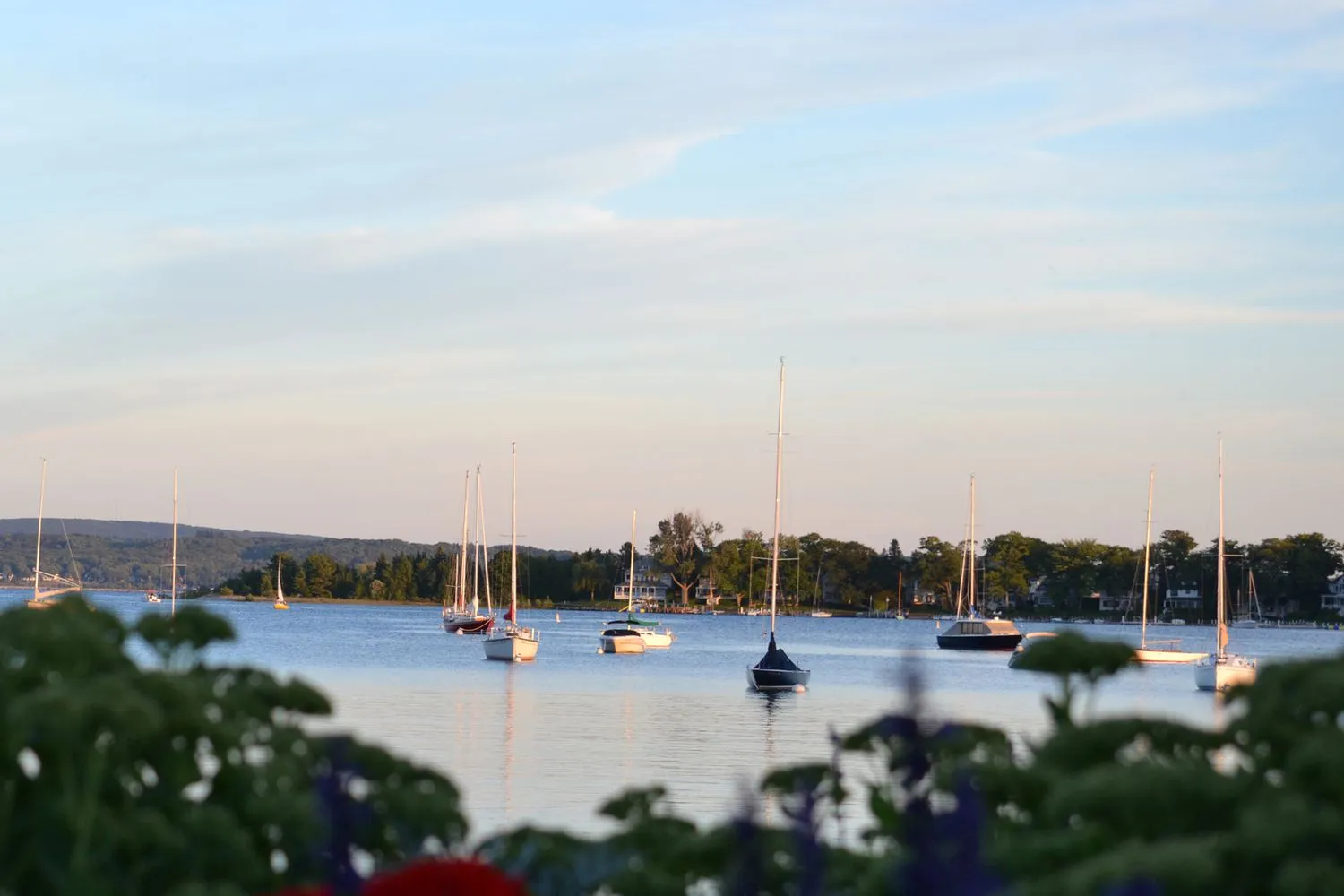 America’s Best Small Lake Town Has Dazzling Waters, Uncrowded Beaches, and a 20-mile-long Tunnel of Trees