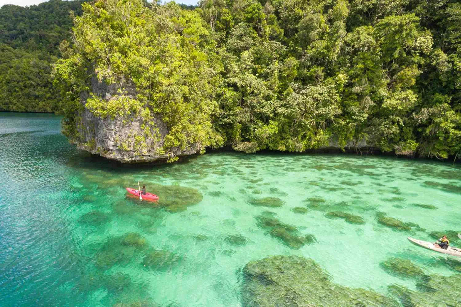 This 340-island Country Has Gorgeous Emerald Lagoons in the Pacific Ocean — and You Can Visit on a Floating Resort
