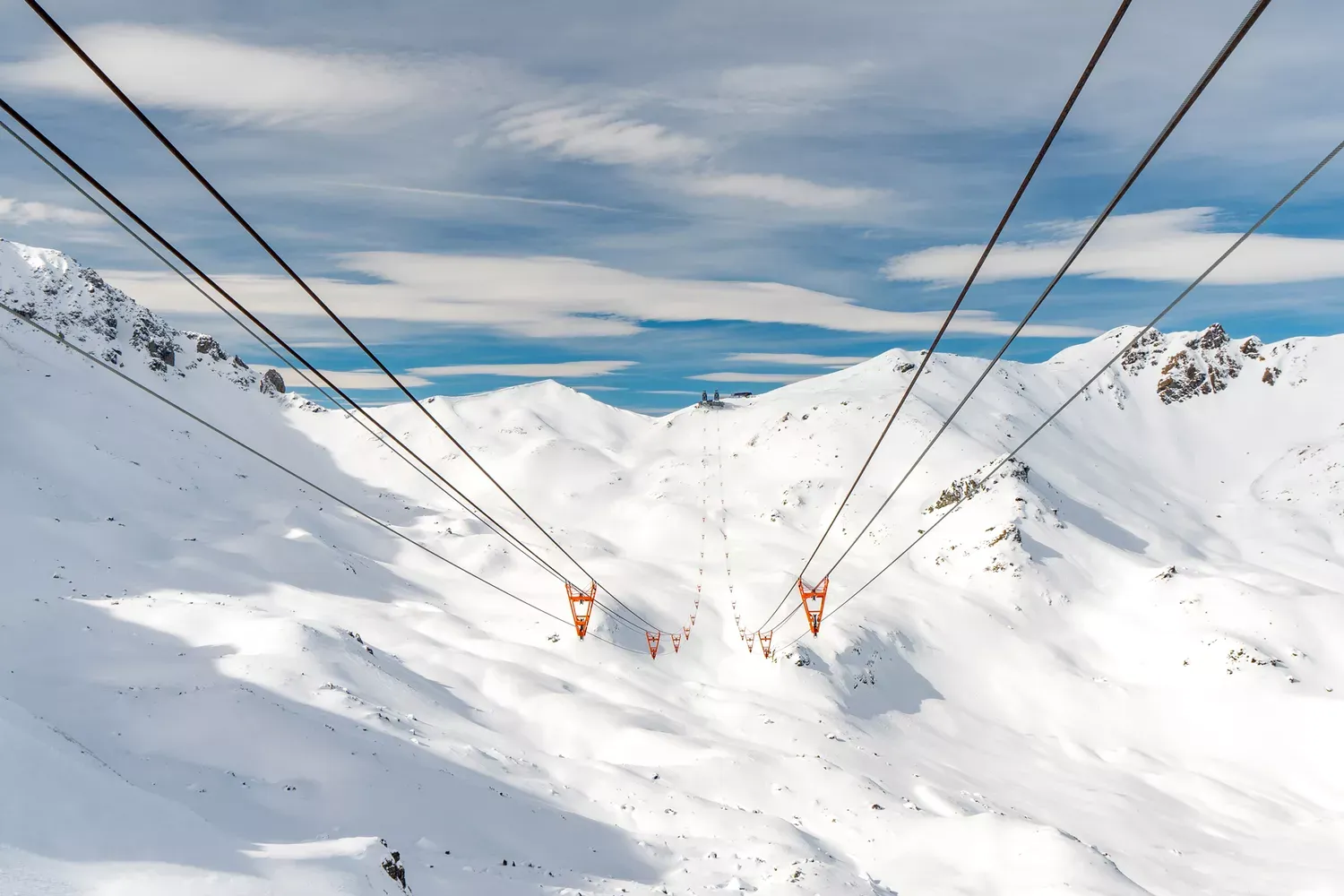 This Swiss Mountain Town Has Five-star Luxury Resorts, Over 100 Miles of Skiable Terrain, and Plenty of Cozy Spots to Eat Fondue